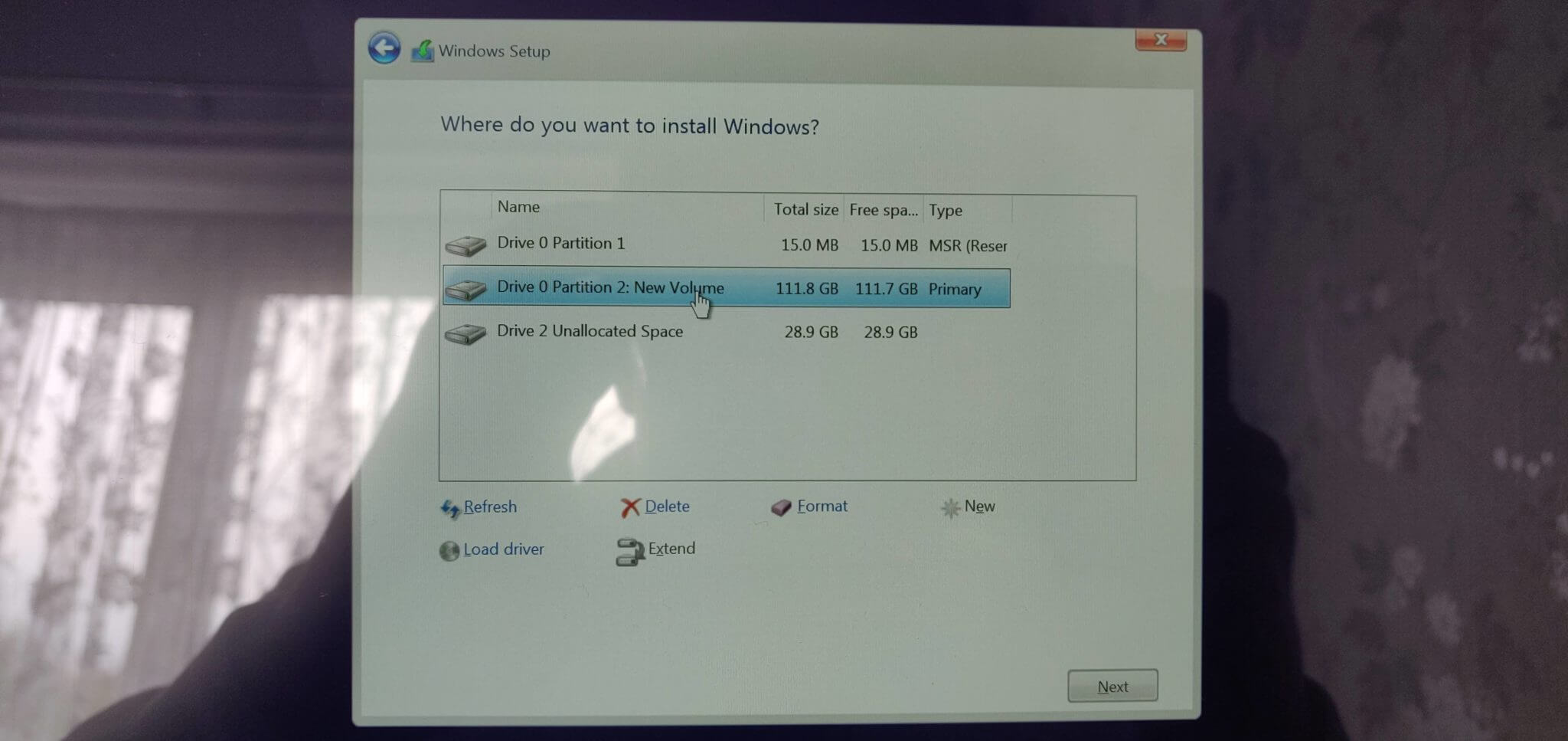 Windows Installation photo showing Drive 0 Partition 2 New Volume which I created earlier